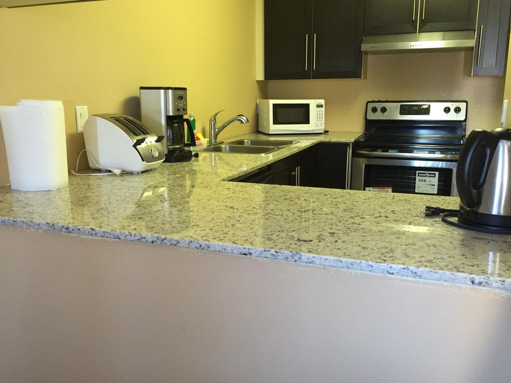 Olympic Suites YYC Екстериор снимка